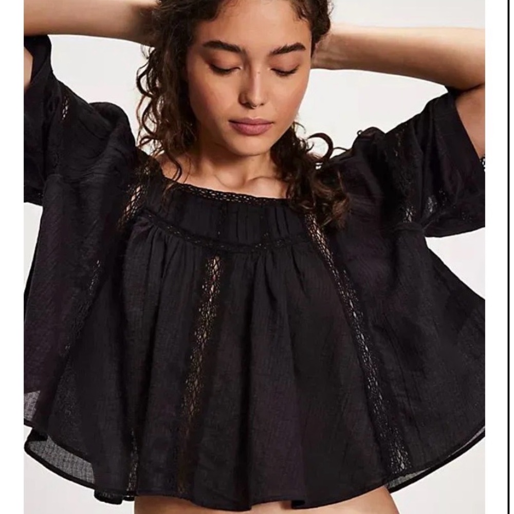 Tie back black top.